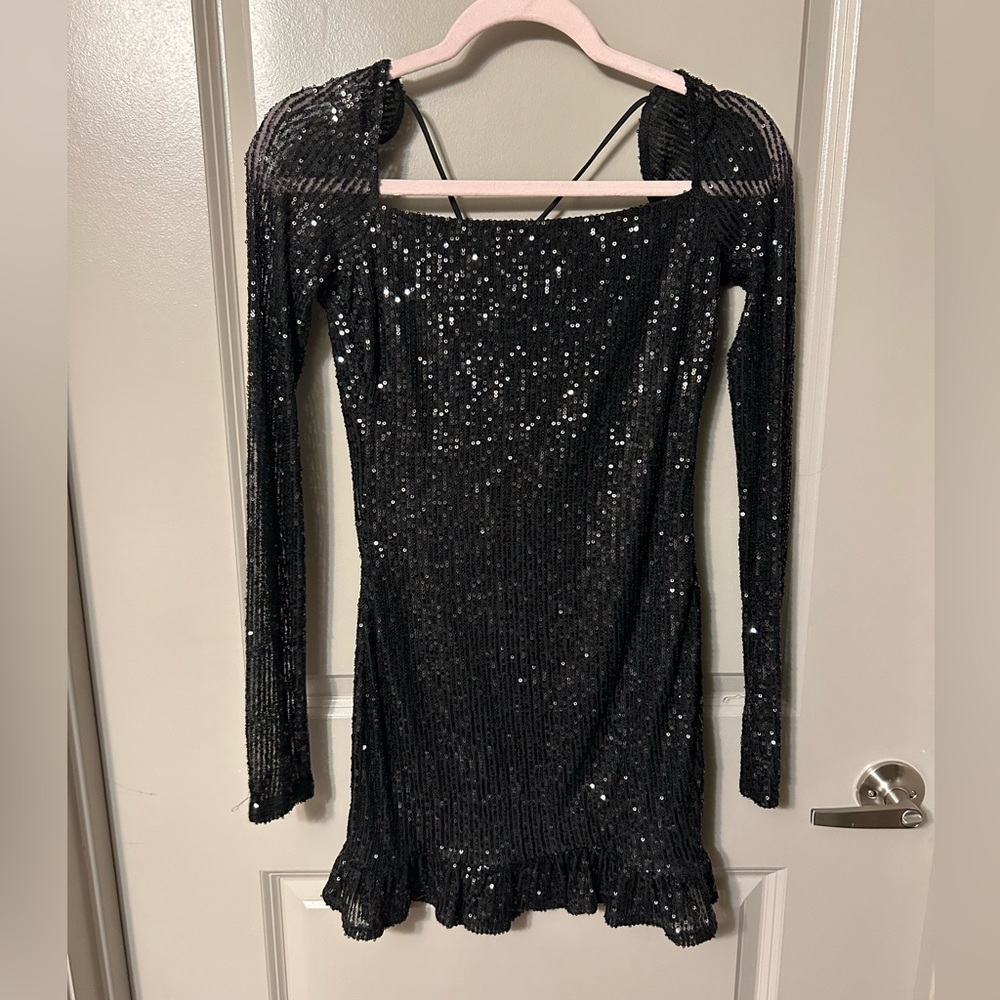 Black sequin Lucy in the Sky dress.